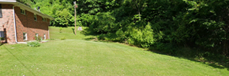 Almost 2 acres in a lovely neighborhood by the Mississippi River
