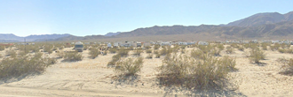 Nice sized lot perfect for a desert getaway and room for all the toys
