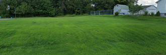 Beautiful lot in a picture perfect small town next to the river